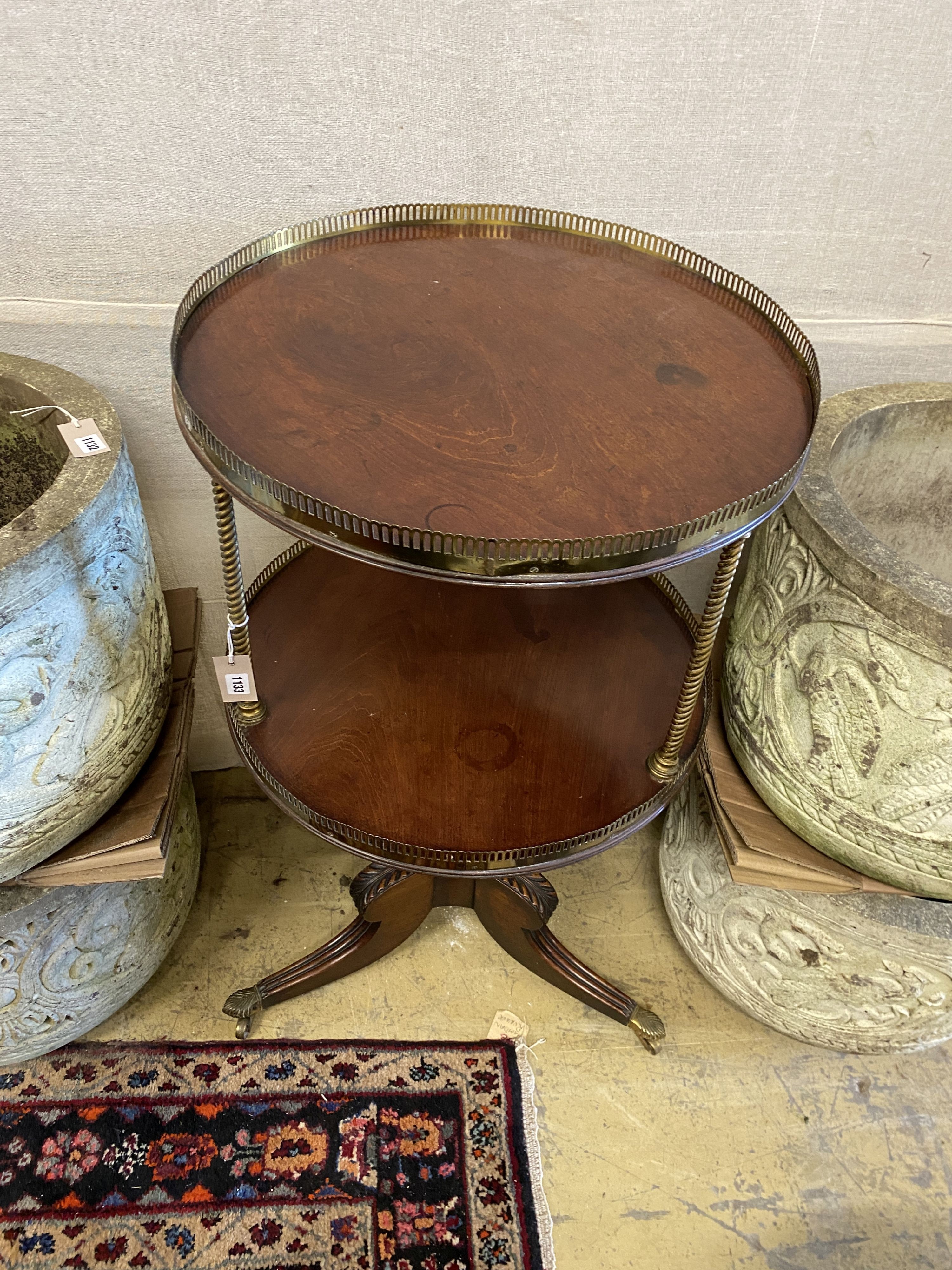 A Regency mahogany two tier whatnot, diameter 56cm, height 101cm